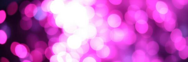Bright pink bokeh lights create a dreamy atmosphere perfect for celebrations and events photo
