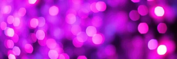 Vibrant purple bokeh lights create an enchanting atmosphere at an evening celebration photo