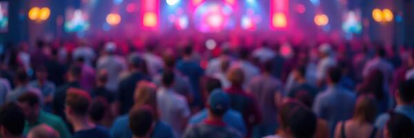 Crowd enjoying live music performance at a vibrant festival in an urban setting during the evening hours photo