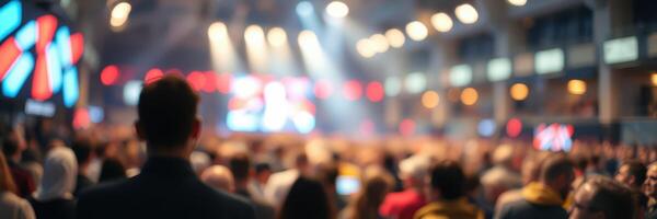 Excitement fills the air at a crowded indoor concert venue during an electrifying musical performance photo