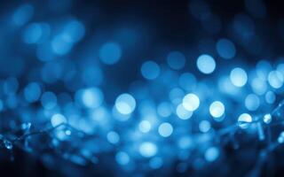 Colorful blue bokeh lights create a dreamy atmosphere in an evening celebration or festive setting photo