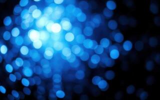 Vibrant blue bokeh lights create an enchanting atmosphere for nighttime events and celebrations photo