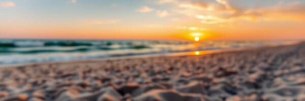 Sunset over the beach creates a serene atmosphere with soft waves and golden sand during the evening hours at the shoreline photo
