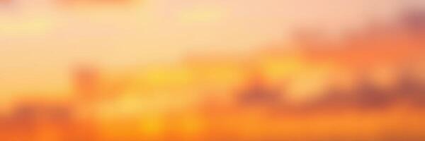 Vibrant sunset over a calm lake set against mountains showcasing nature's beauty during the evening hours photo