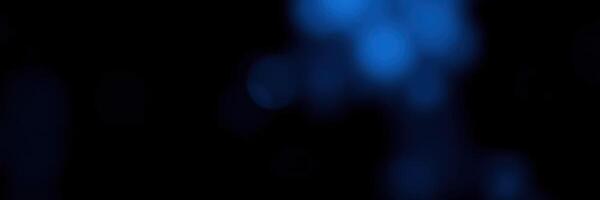 Blue abstract background with soft glowing lights creating a calming atmosphere photo