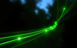 Bright green laser beams create an enchanting visual display in a dark outdoor environment at night photo