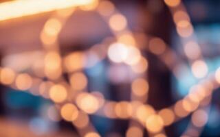 Softly glowing bokeh lights create a warm, inviting atmosphere in a cozy indoor setting during the evening photo