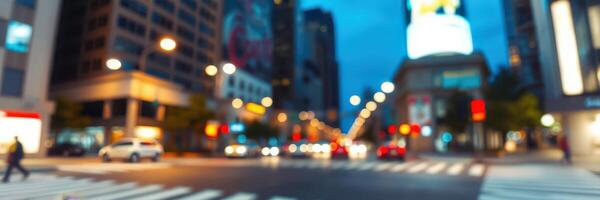 City street at dusk with blurred lights and bustling traffic in a vibrant urban setting photo