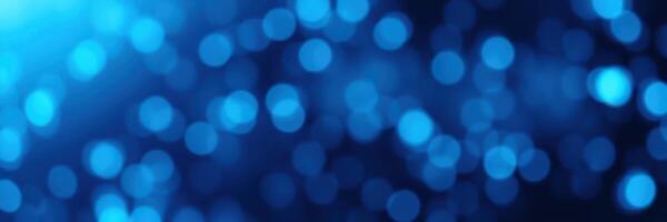 Vibrant blue bokeh lights create a dreamlike atmosphere in a dimly lit space during a night event photo