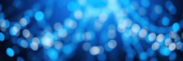 Beautiful blue bokeh effect creating a dreamy atmosphere at a nighttime event photo