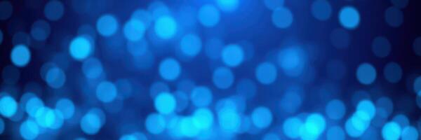 Dynamic blue bokeh background creates a vibrant atmosphere suitable for various creative projects photo