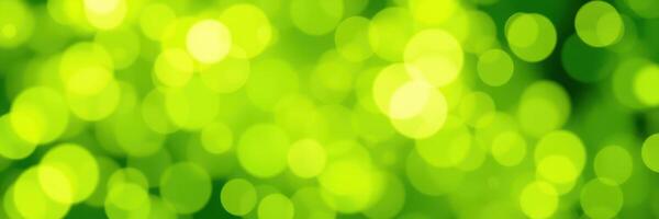 Vibrant green bokeh background creates a lively atmosphere in a natural setting during daytime photo