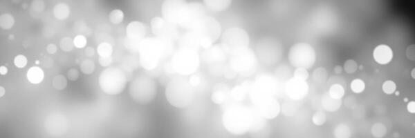 Soft, shimmering light patterns create a magical ambiance in a blurred background setting photo