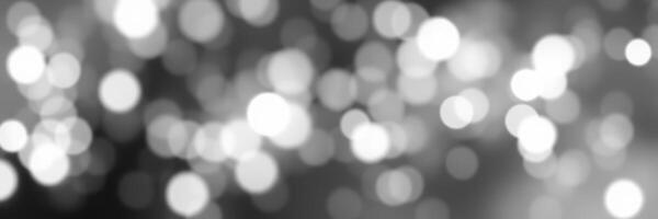 Soft, blurred lights create a soothing ambiance for relaxation and inspiration in a darkened space photo
