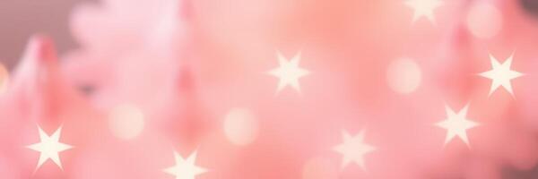 Soft pink lights create a dreamy atmosphere with stars glowing in the background during a festive celebration photo