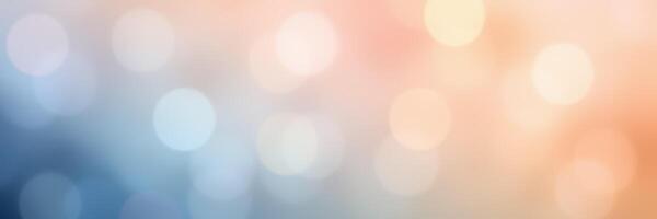 Smooth gradient of soft bokeh lights in blue and peach hues creates a tranquil atmosphere for artistic projects photo