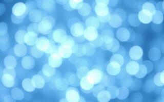 Stunning blue bokeh background with a mix of soft circles creating a tranquil atmosphere photo