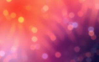 Colorful abstract background with vibrant bokeh effects creating a dreamy atmosphere at dusk photo