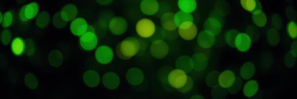 Vibrant green bokeh lights create a magical atmosphere in a festive celebration at night photo
