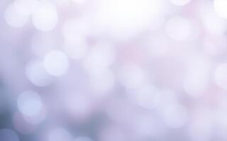 Soft bokeh lights create a dreamy atmosphere in a blurred background with pastel hues photo