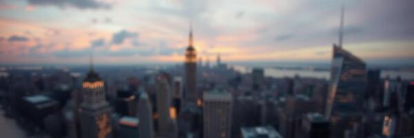 Sunset view of Manhattan skyline featuring iconic buildings with colorful clouds in the background photo