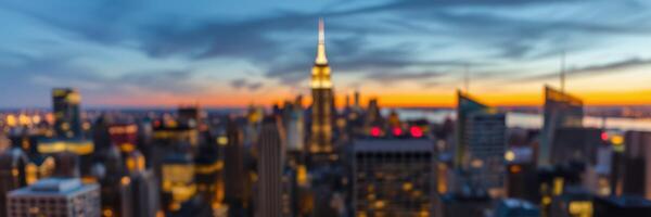 Sunset skyline view of New York City with soft focus showing iconic buildings and colorful sky photo