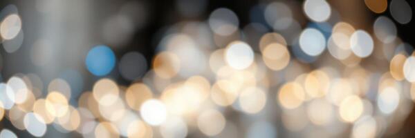 Vibrant bokeh lights creating a festive atmosphere during an evening celebration in a cozy setting photo