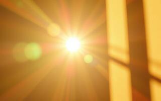 Bright sunlight streaming through a window creating warm rays in a cozy indoor setting during morning hours photo