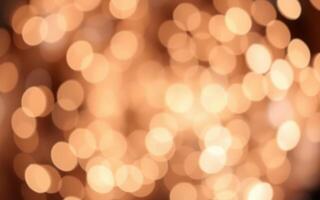 Warm golden bokeh lights create a festive atmosphere for celebrations in the evening photo