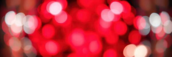 Vibrant red bokeh lights create a festive atmosphere for events and celebrations in urban settings at night photo
