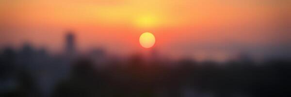 Beautiful sunset over the city skyline with vibrant orange and yellow hues during the evening photo