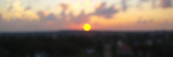 Beautiful sunset view from a high vantage point over a city skyline during twilight hours photo