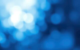 Abstract blue bokeh effect created by soft light patterns in a blurred background photo