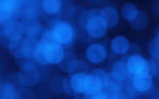 Beautiful blue bokeh background creates a calming atmosphere for creative designs and artistic projects photo