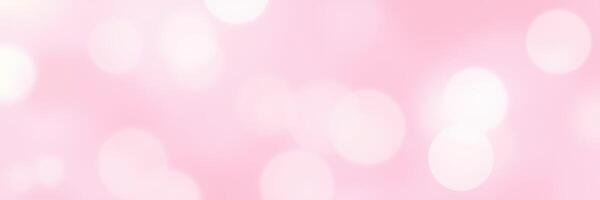 Soft pink bokeh background with subtle highlights creating a gentle, dreamlike atmosphere photo