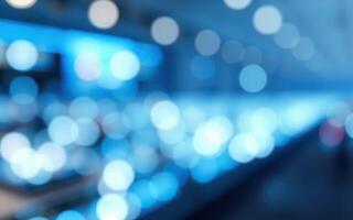 Background of blue lights creating a soft bokeh effect in an urban environment at night photo