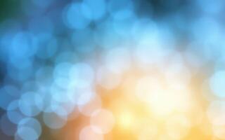 Bright and colorful bokeh created by ambient light during sunset in nature scenery photo