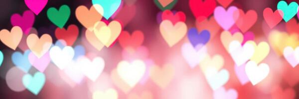 Colorful hearts create a festive backdrop for celebrations and romantic moments at a cheerful event photo