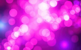 Colorful light bokeh creates vibrant atmosphere in an artistic setting during an evening event photo