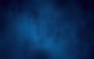 Mysterious blue mist fills the air at twilight under a clear night sky photo