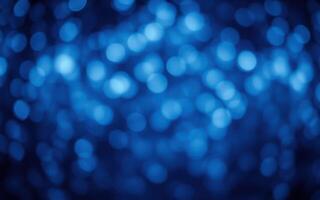 Colorful blue bokeh background with soft glowing orbs and abstract design photo