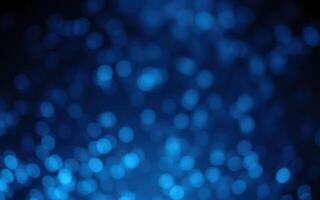 Vibrant blue bokeh lights create a dreamy atmosphere in a nighttime setting photo