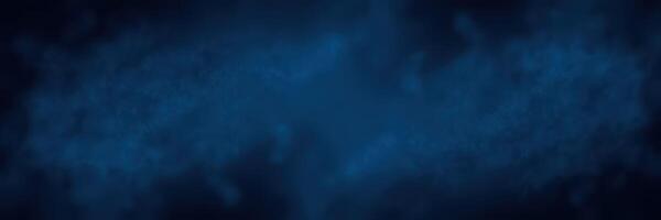 Dark blue smoke swirls creating a mysterious atmosphere in a dimly lit environment photo