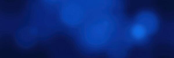 Colorful blue abstract backdrop with soft bokeh lights creating a serene atmosphere photo