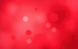 Vibrant abstract background with shades of red and soft circular patterns creating depth and texture photo