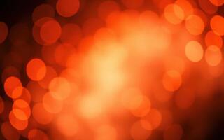 Vibrant orange bokeh lights create a warm and inviting atmosphere during a nighttime celebration in a lively urban setting photo