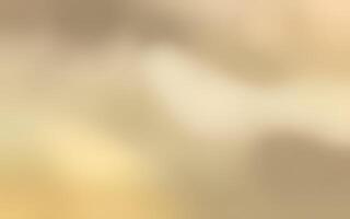 Soft golden hues blend together creating a serene and calming atmosphere in a blurred background photo