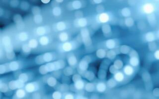 Soft blue bokeh lights create a serene atmosphere perfect for relaxing or inspiring creativity during evening hours photo