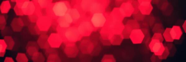 Vibrant red bokeh lights create a captivating atmosphere during nighttime celebrations photo