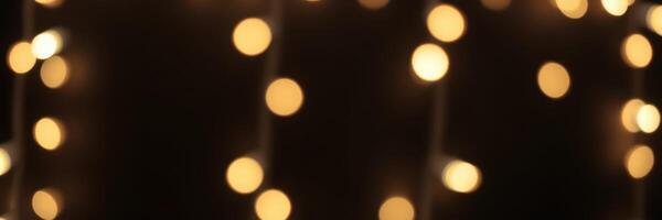 String lights illuminate a cozy atmosphere, enhancing the ambiance of a gathering during the evening hours photo